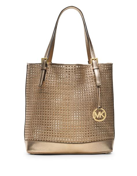 michael kors perforated logo red bag|Michael Kors purse color chart.